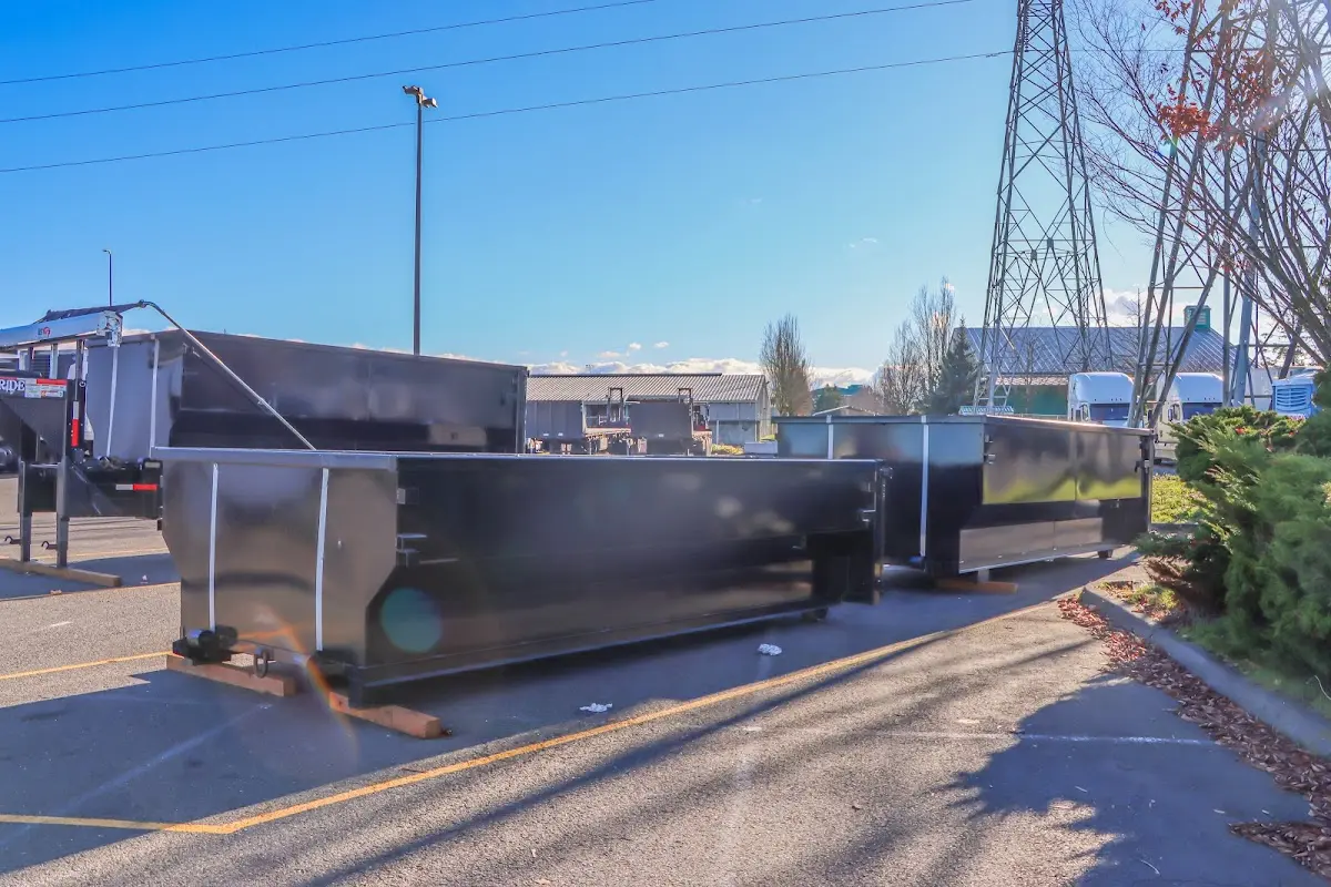 Roll-off dumpster ready for waste disposal at job site for Concrete Dumpster Rental in Montgomery